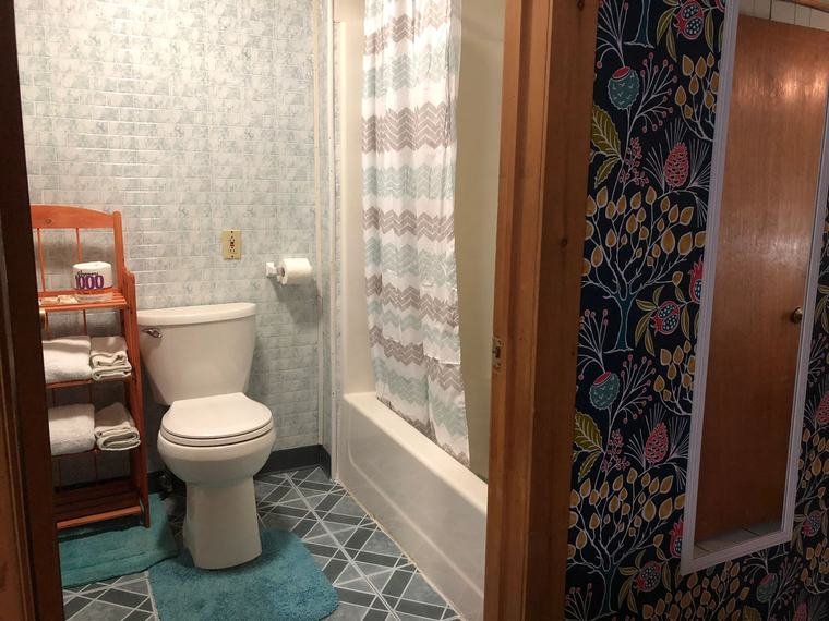 Suite bathroom with tub and shower