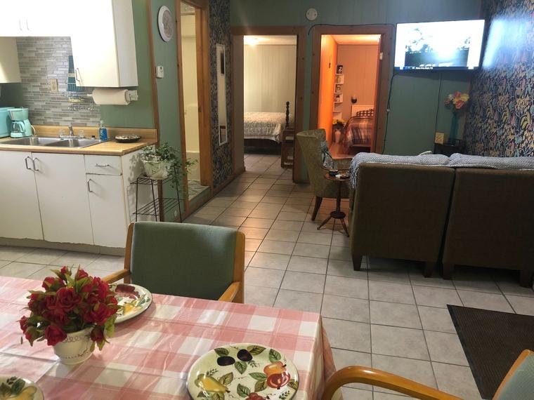 The kitchen and living area of the two-bedroom suite